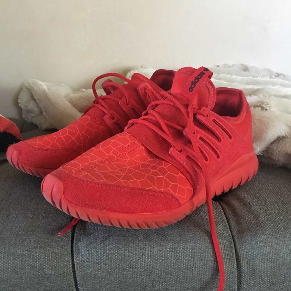 Red Adidas Tublular shoes
